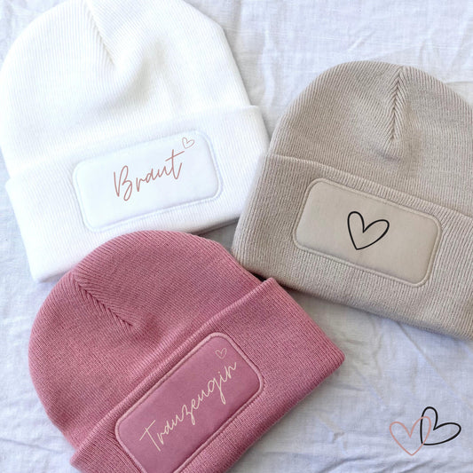 Personalisierte Mütze mit Wunschwort und Symbol